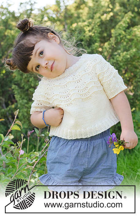 Marshmallow Morning / DROPS Children 49-1 - Stickad, kort tröja till barn i DROPS Safran eller DROPS BabyMerino. Arbetet stickas uppifrån och ner med runt ok och vågmönster. Storlek 2 – 12 år.
