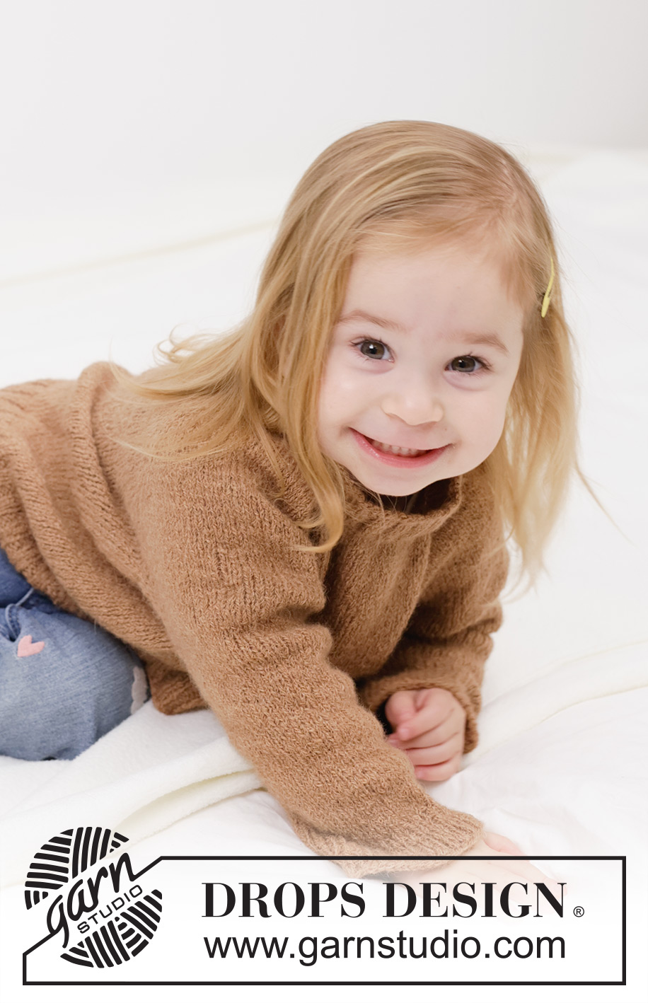 Cocoa Comfort / DROPS Children 49-12 - Dziecięcy sweter na drutach, przerabiany od góry do dołu, z włóczki DROPS Sky. Przerabiany dżersejem, z reglanowymi rękawami. Od 2 do 12 lat.