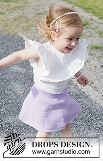 Amethyst Charm / DROPS Children 49-19 - Knitted knee-length skirt for children in DROPS Cotton Merino. The piece is worked top down in stocking stitch. Sizes 2-14 years.