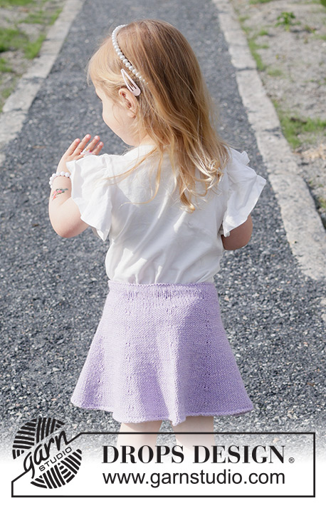 Amethyst Charm / DROPS Children 49-19 - Knitted knee-length skirt for children in DROPS Cotton Merino. The piece is worked top down in stocking stitch. Sizes 2-14 years.