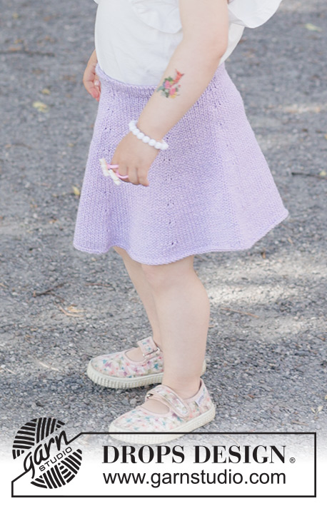 Amethyst Charm / DROPS Children 49-19 - Knitted knee-length skirt for children in DROPS Cotton Merino. The piece is worked top down in stocking stitch. Sizes 2-14 years.