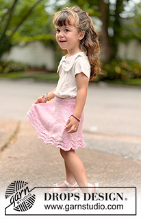 Strawberry Swirl / DROPS Children 49-20 - Knitted knee-length skirt for children in DROPS Cotton Merino. The piece is worked top down in stocking stitch, with a wave pattern. Sizes 2-14 years.