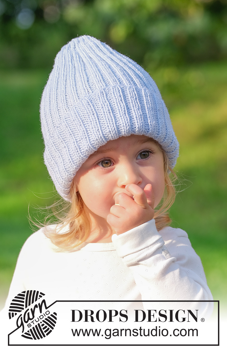Little Could Hat / DROPS Children 49-24 - Gebreide muts voor baby’s en kinderen in DROPS BabyMerino. Het werk wordt van onder naar boven gebreid in boordsteek. Maten 2 - 14 jaar.