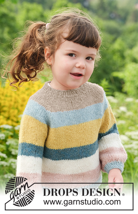 Happy Hue Sweater / DROPS Children 49-5 - Stickad tröja till barn i DROPS Sky. Arbetet stickas uppifrån och ner med raglan och ränder. Storlek 2 - 12 år.