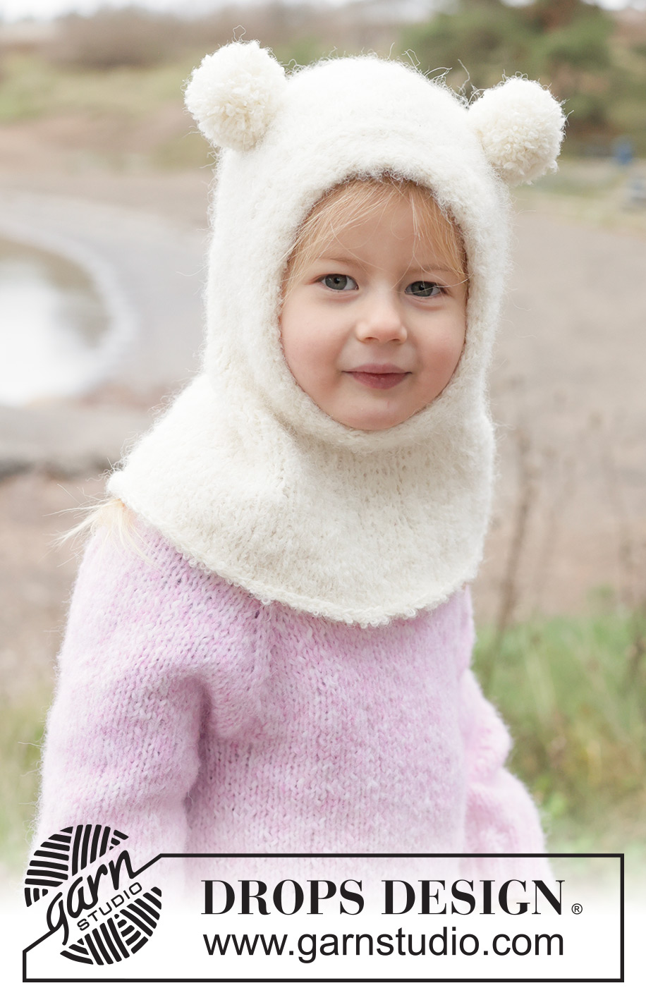 Snow Bear Balaclava / DROPS Children 50-12 - Strikket elefanthue / balaclava til børn i DROPS Alpaca Bouclé og DROPS BabyMerino. Arbejdet strikkes i glatstrik og i-cord. Størrelse 2 - 14 år.