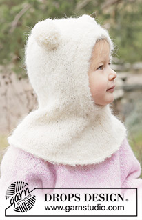 Snow Bear Balaclava / DROPS Children 50-12 - Strikket elefanthue / balaclava til børn i DROPS Alpaca Bouclé og DROPS BabyMerino. Arbejdet strikkes i glatstrik og i-cord. Størrelse 2 - 14 år.