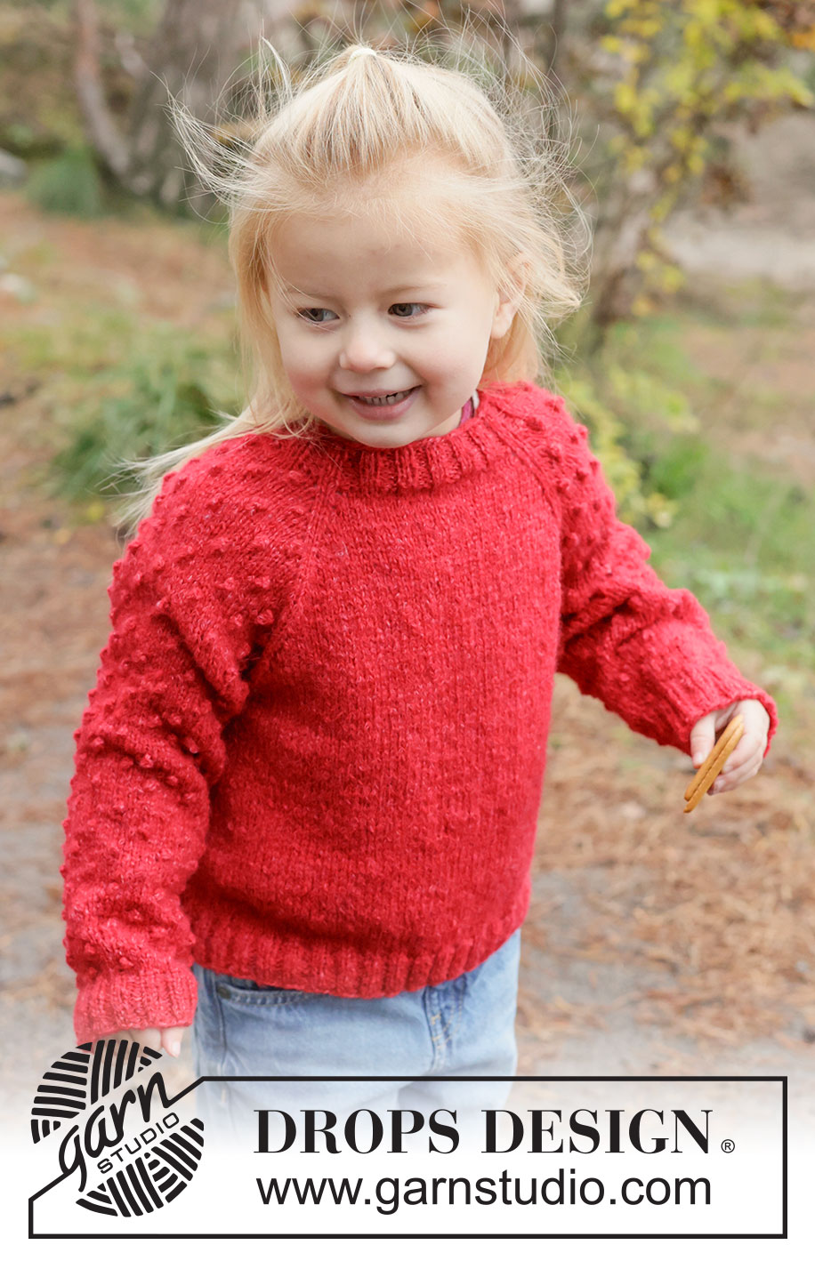 Cherry Pop Sweater / DROPS Children 50-14 - Jersey a punto para niños en DROPS Sky. La labor se trabaja de arriba abajo en punto jersey con raglán y motas. Tallas 2 - 14 años.