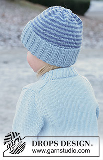 Polar Playtime Sweater / DROPS Children 50-17 - Kötött pulóver és sapka gyerekeknek DROPS Merino Extra Fine fonalból. A darabot fentről lefelé haladva kötjük, harisnyakötéssel és európai vállrésszel. A sapkát körben haladva készítjük, csíkokkal. 2 - 14 éveseknek való méretekben
