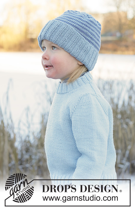 Polar Playtime Sweater / DROPS Children 50-17 - Kötött pulóver és sapka gyerekeknek DROPS Merino Extra Fine fonalból. A darabot fentről lefelé haladva kötjük, harisnyakötéssel és európai vállrésszel. A sapkát körben haladva készítjük, csíkokkal. 2 - 14 éveseknek való méretekben
