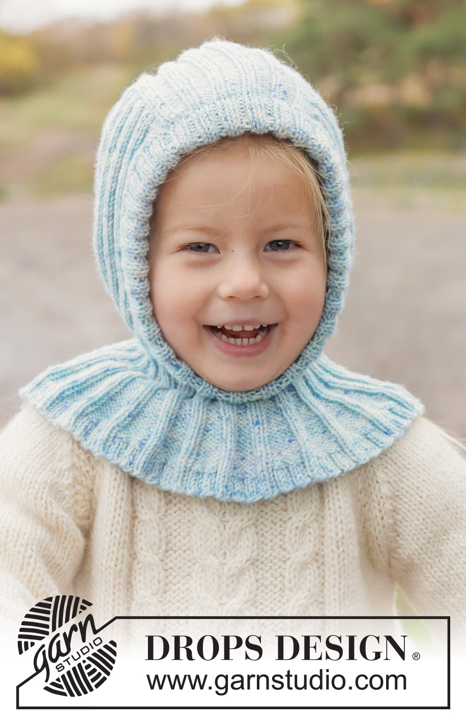 Crystal Chill Balaclava / DROPS Children 50-18 - Strikket elefanthue / balaclava til børn i DROPS BabyMerino. Arbejdet strikkes nedefra og op i rib. Størrelse 2 - 14 år.