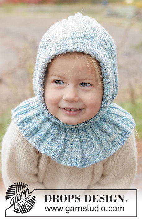 Crystal Chill Balaclava / DROPS Children 50-18 - Strikket elefanthue / balaclava til børn i DROPS BabyMerino. Arbejdet strikkes nedefra og op i rib. Størrelse 2 - 14 år.