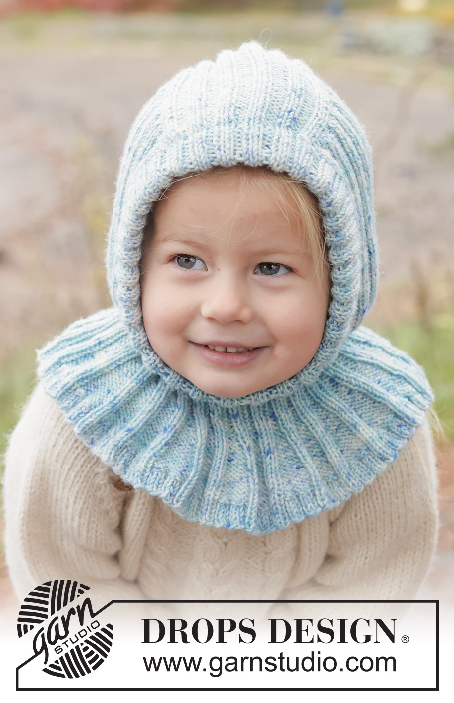 Crystal Chill Balaclava / DROPS Children 50-18 - Strikket elefanthue / balaclava til børn i DROPS BabyMerino. Arbejdet strikkes nedefra og op i rib. Størrelse 2 - 14 år.