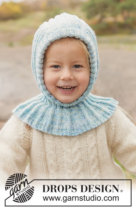 Crystal Chill Balaclava / DROPS Children 50-18 - Strikket elefanthue / balaclava til børn i DROPS BabyMerino. Arbejdet strikkes nedefra og op i rib. Størrelse 2 - 14 år.