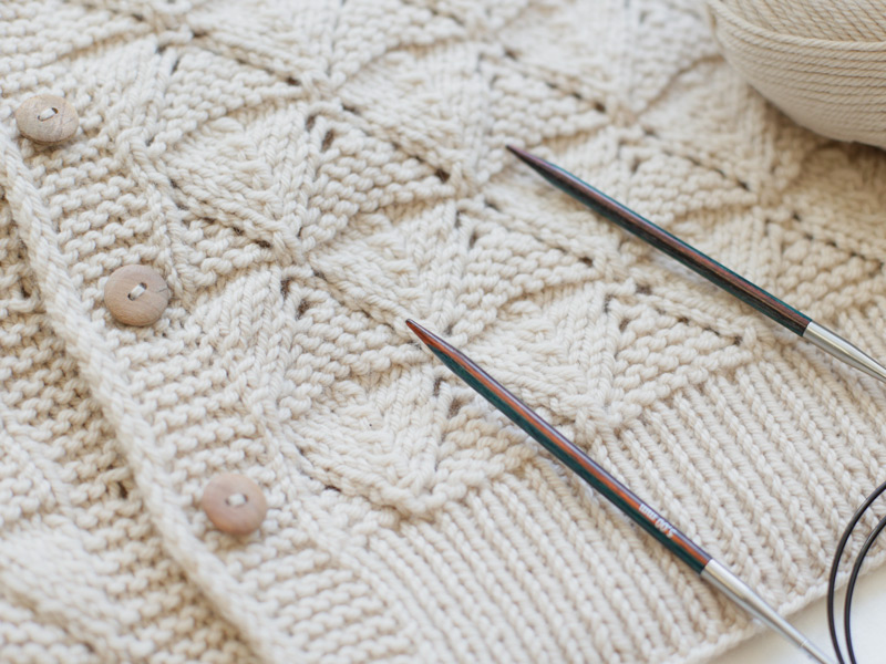 Knitted cardigan and birch interchangeable circular needles