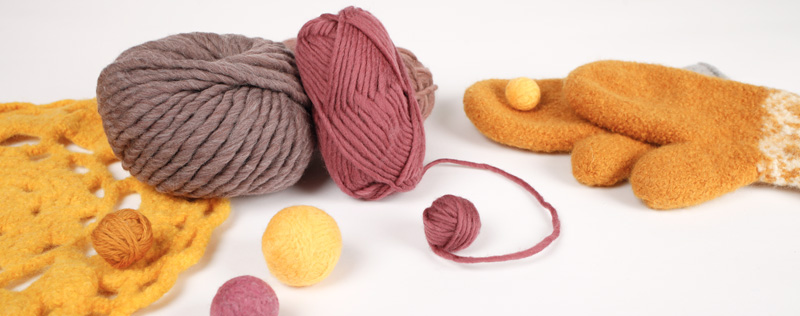Felted seating pad, mittens, balls and feltable yarn