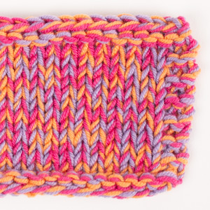 Swatch of DROPS Baby Merino 36, electric orange 
														+ DROPS Baby Merino 08, cerise + DROPS Baby Merino 14, purple