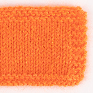 Swatch of DROPS Baby Merino 36, laranja eléctrico 
														+ DROPS Kid-Silk 49, laranja eléctrico