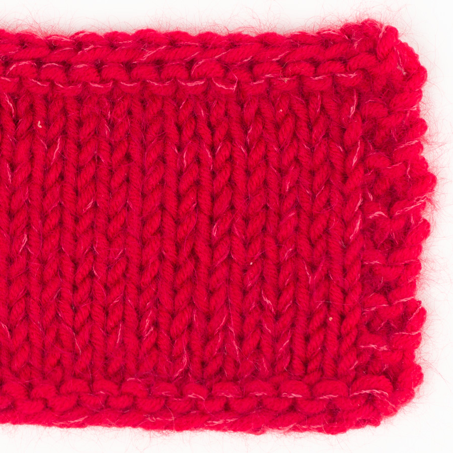 Swatch of DROPS Big Merino 27, karmiinpunane 
											+ DROPS Kid-Silk 14, punane