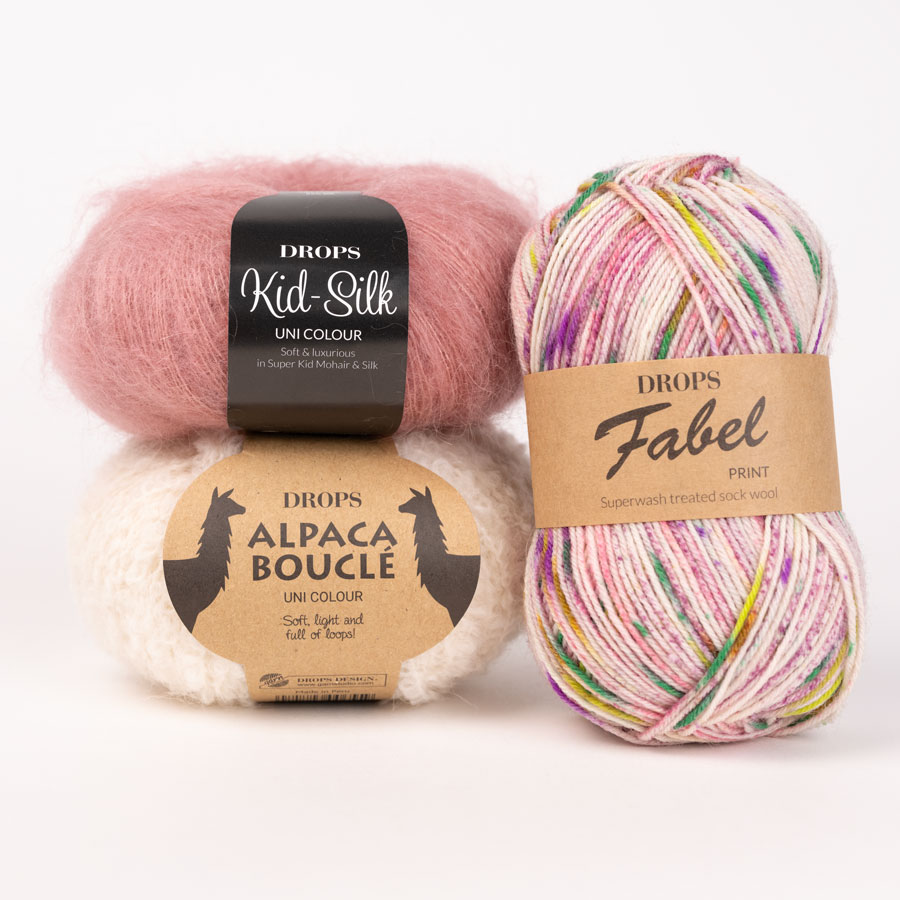 DROPS Alpaca Bouclé 0100, natur + DROPS Fabel 927, lavendelfält + DROPS Kid-Silk 46, körsbär sorbet</div>