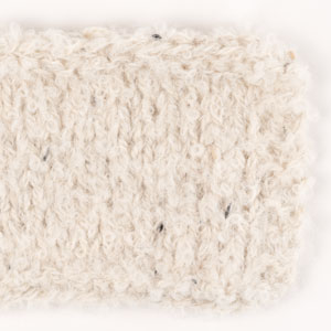 Swatch of DROPS Alpaca Bouclé 0100, off white 
														+ DROPS Soft Tweed 22, marble dreams