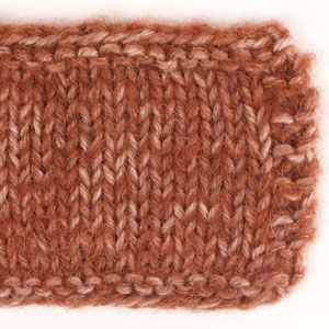 Swatch of DROPS Brushed Alpaca Silk 24, rust 
														+ DROPS Fiesta 35, copper