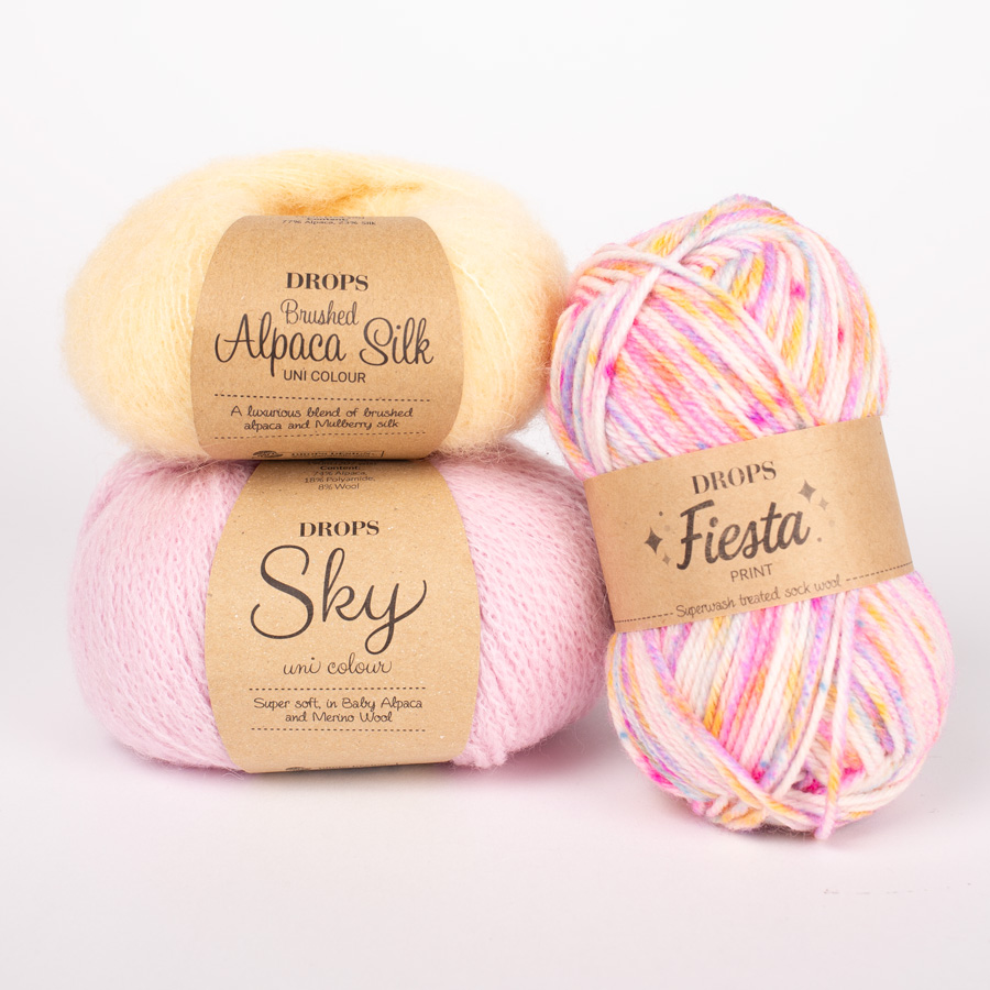 Yarn combinations skeins of DROPS Brushed Alpaca Silk 30, yellow 
											+ DROPS Fiesta 14, rainbow sprinkles + DROPS Sky 27, powder pink