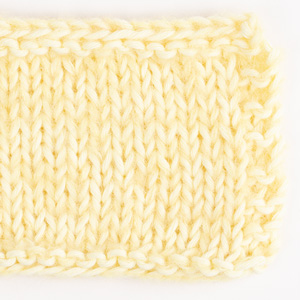 Swatch of DROPS Brushed Alpaca Silk 30, yellow 
														+ DROPS Paris 19, light yellow