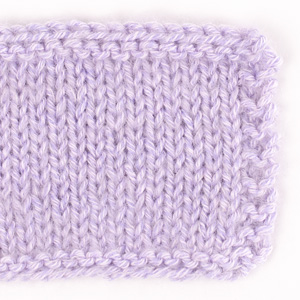 Swatch of DROPS Cotton Merino 31, sweet orchid 
														+ DROPS Kid-Silk 09, light lavender