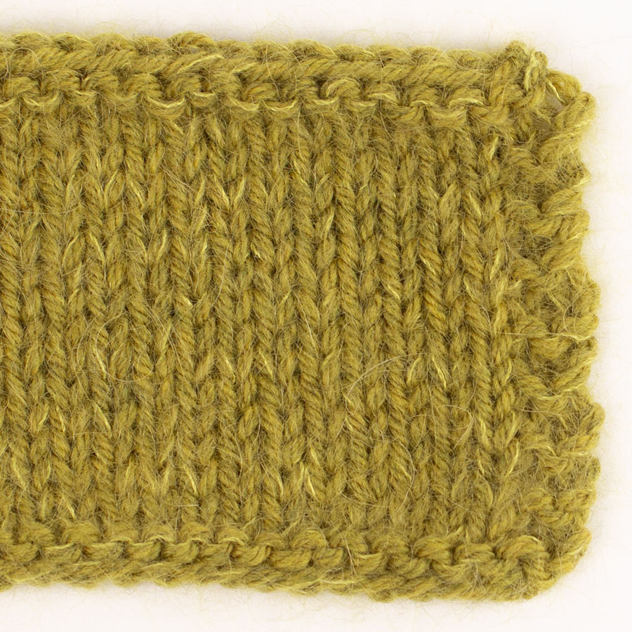 Swatch of DROPS Daisy 31, olive oil 
											+ DROPS Kid-Silk 67, bright olive
