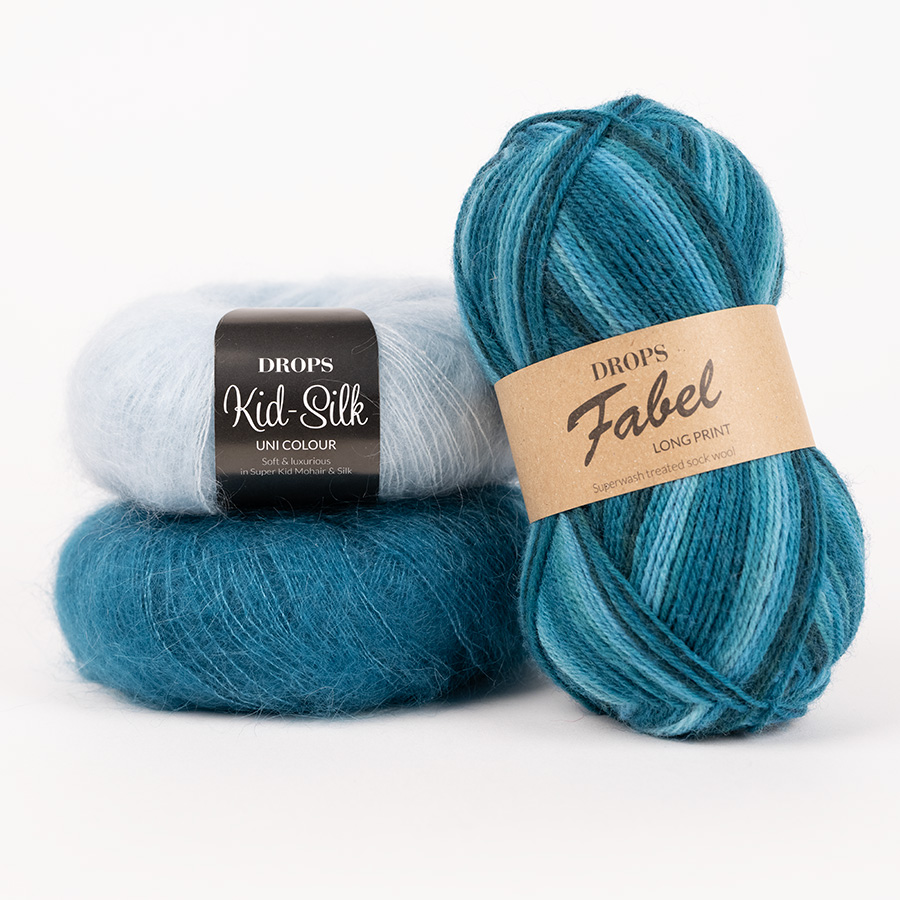 Yarn combinations skeins of DROPS Fabel 918, emerald city 
											+ DROPS Kid-Silk 24, petrol + DROPS Kid-Silk 58, aquamarine