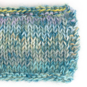 Yarn combinations skeins of DROPS Fabel 921, einhyrningapartý 
														+ DROPS Kid-Silk 18, eplagrænn + DROPS Kid-Silk 24, bensínblár