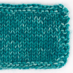 Swatch of DROPS Fiesta 34, smaragd 
														+ DROPS Kid-Silk 24, petrol