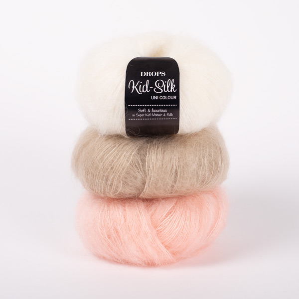 Yarn combinations of Kid-Silk 01, blanco hueso + DROPS Kid-Silk 53, melocotón claro + DROPS Kid-Silk 54, arena clara