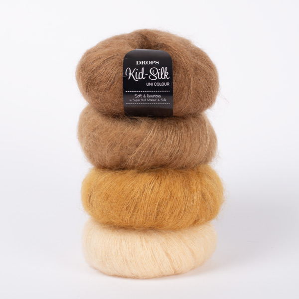 DROPS Kid-Silk 29, vanilj + DROPS Kid-Silk 30, curry + DROPS Kid-Silk 50, karamell</div>+ DROPS Kid-Silk 51, toffee</div>