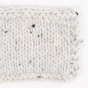 Swatch of DROPS Kid-Silk 59, ice crystal 
														+ DROPS Soft Tweed 20, salt and pepper