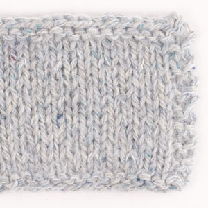 Swatch of DROPS Kid-Silk 59, iskrystall 
														+ DROPS Soft Tweed 21, stillevann