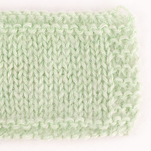 Swatch of Alpaca 9030, pistachio ice cream																	+ DROPS Kid-Silk 47, pistachio ice cream