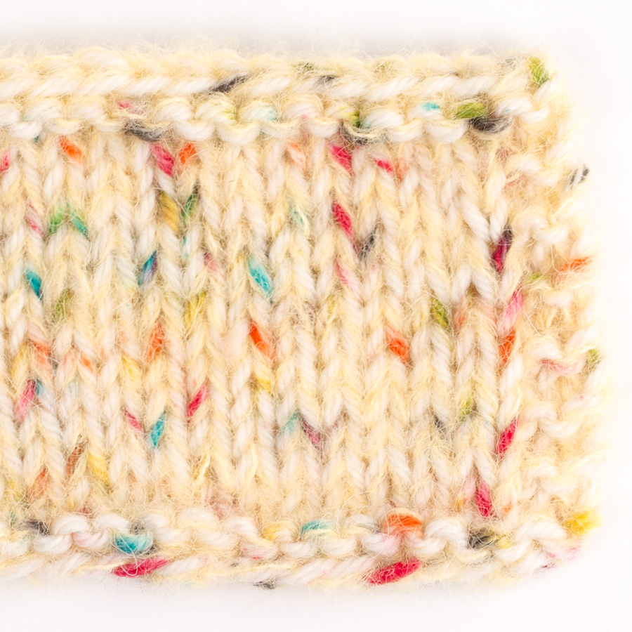 Swatch of DROPS Brushed Alpaca Silk 30, yellow 
											+ DROPS Fiesta 27, winter carnival