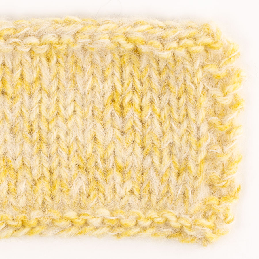 Swatch of DROPS Brushed Alpaca Silk 40, marzipan 
											+ DROPS Fiesta 23, dandelion dream