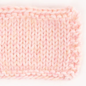 Swatch of DROPS Daisy 06, powder pink 
														+ DROPS Kid-Silk 29, vanilla + DROPS Kid-Silk 62, strawberry ice cream