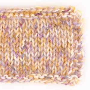 Swatch of Fabel 924, confetti cake																	+ DROPS Kid-Silk 11, lavender+ DROPS Kid-Silk 30, curry