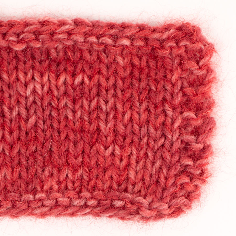 Swatch of DROPS Fiesta 39, cherry jam 
											+ DROPS Kid-Silk 14, red
