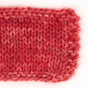 Swatch of DROPS Fiesta 39, cherry jam 
														+ DROPS Kid-Silk 14, red