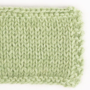Swatch of DROPS Flora 16, pistachio 
														+ DROPS Kid-Silk 18, apple green