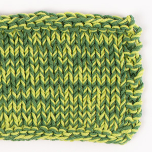 Swatch of DROPS Safran 31, apple green 
														+ DROPS Safran 78, forest green