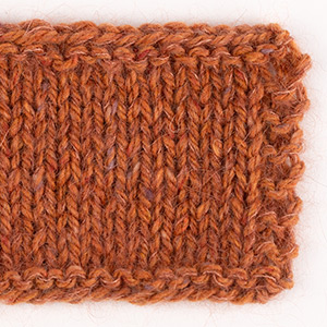 Yarn combinations skeins of DROPS Kid-Silk 33, ryð 
														+ DROPS Soft Tweed 18, gulrótakaka